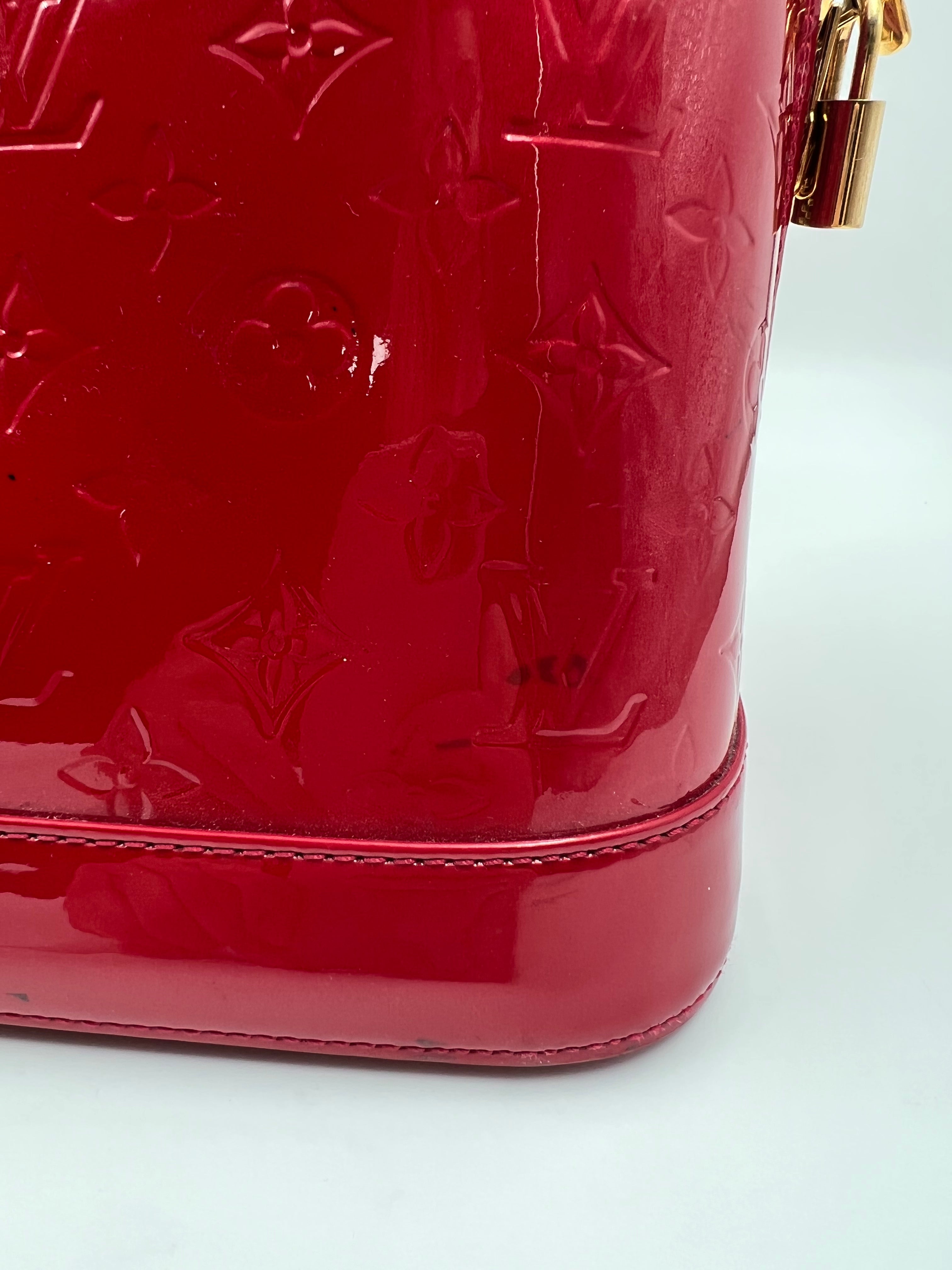 Louis Vuitton Monogram Vernis leather Alma MM handbag in red color
