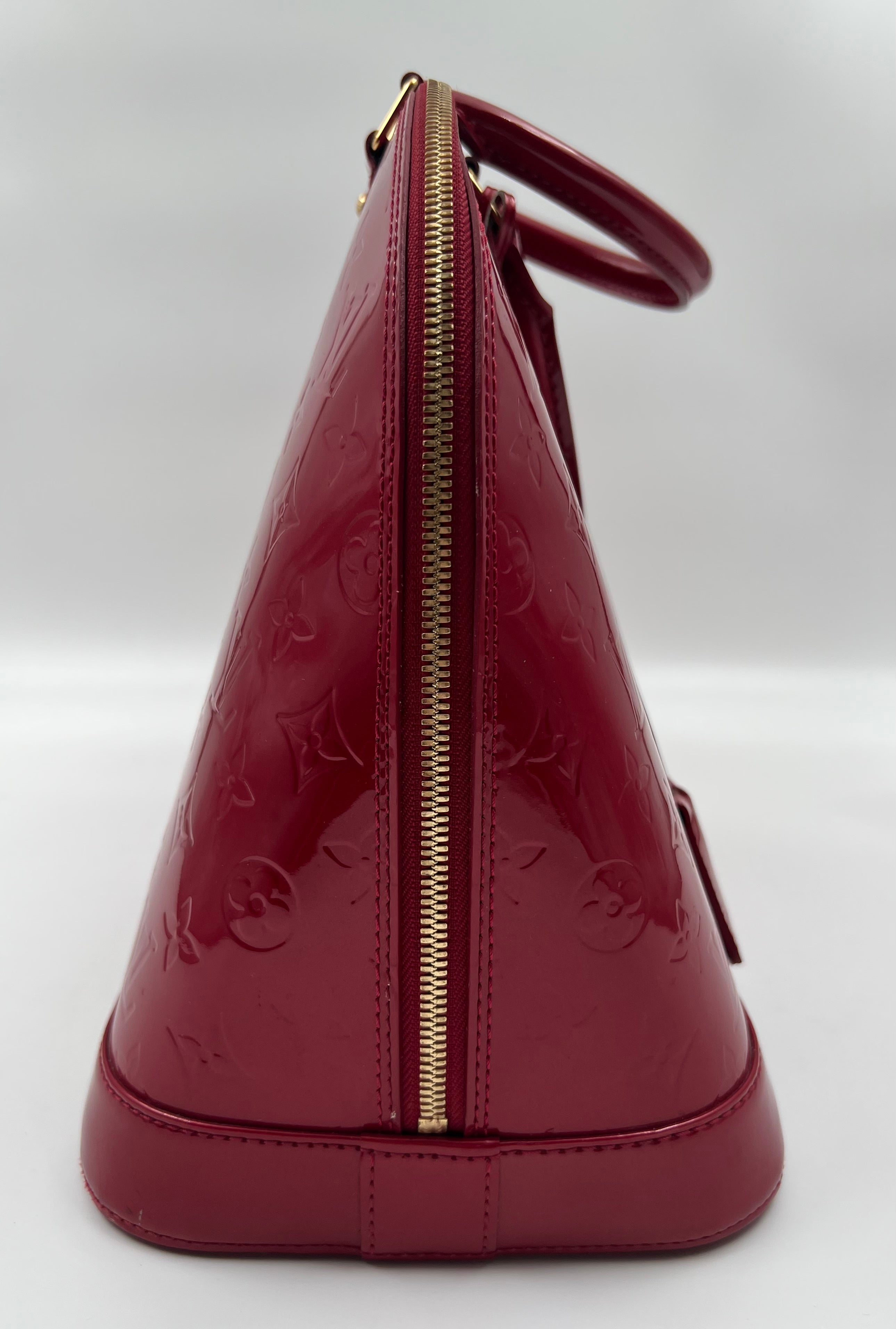 Louis Vuitton Monogram Vernis leather Alma MM handbag in red color