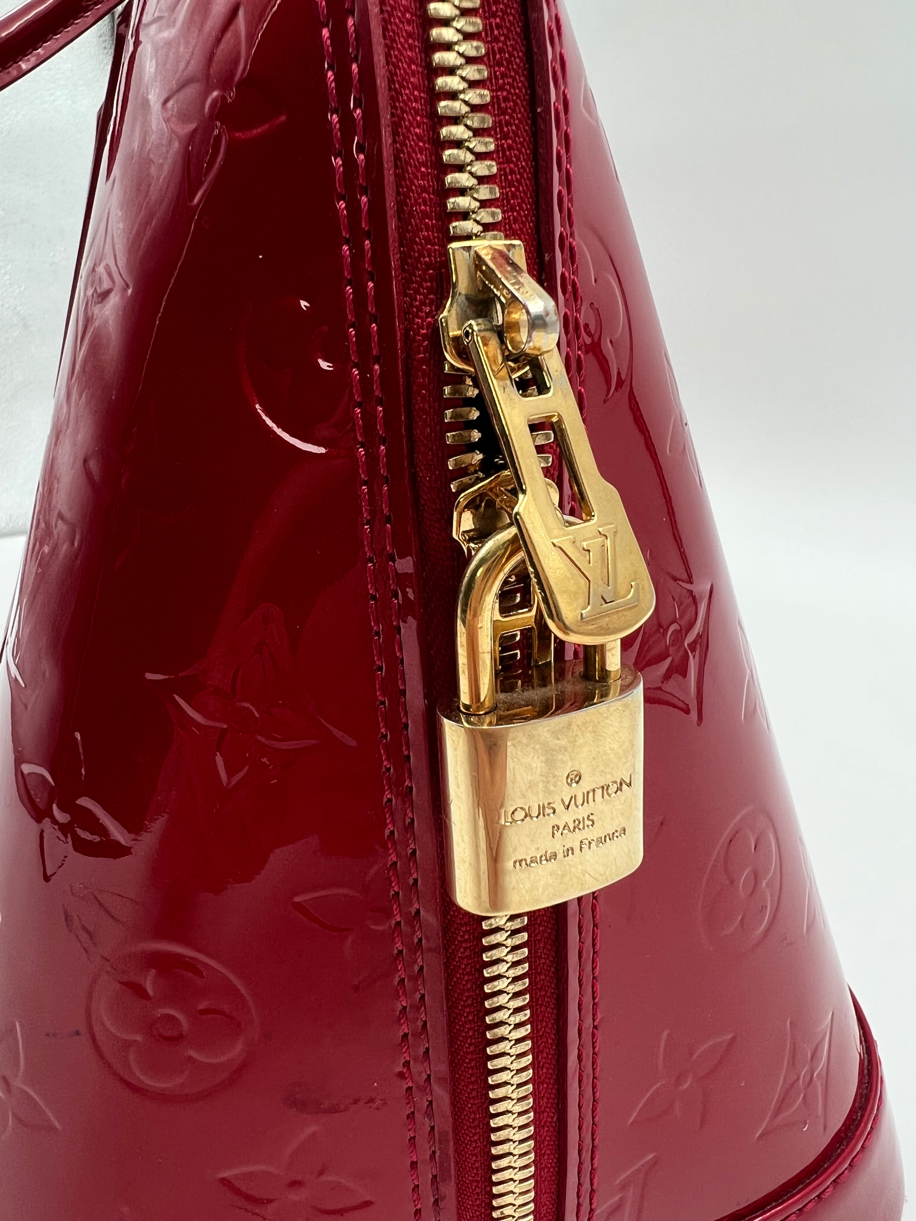 Louis Vuitton Monogram Vernis leather Alma MM handbag in red color