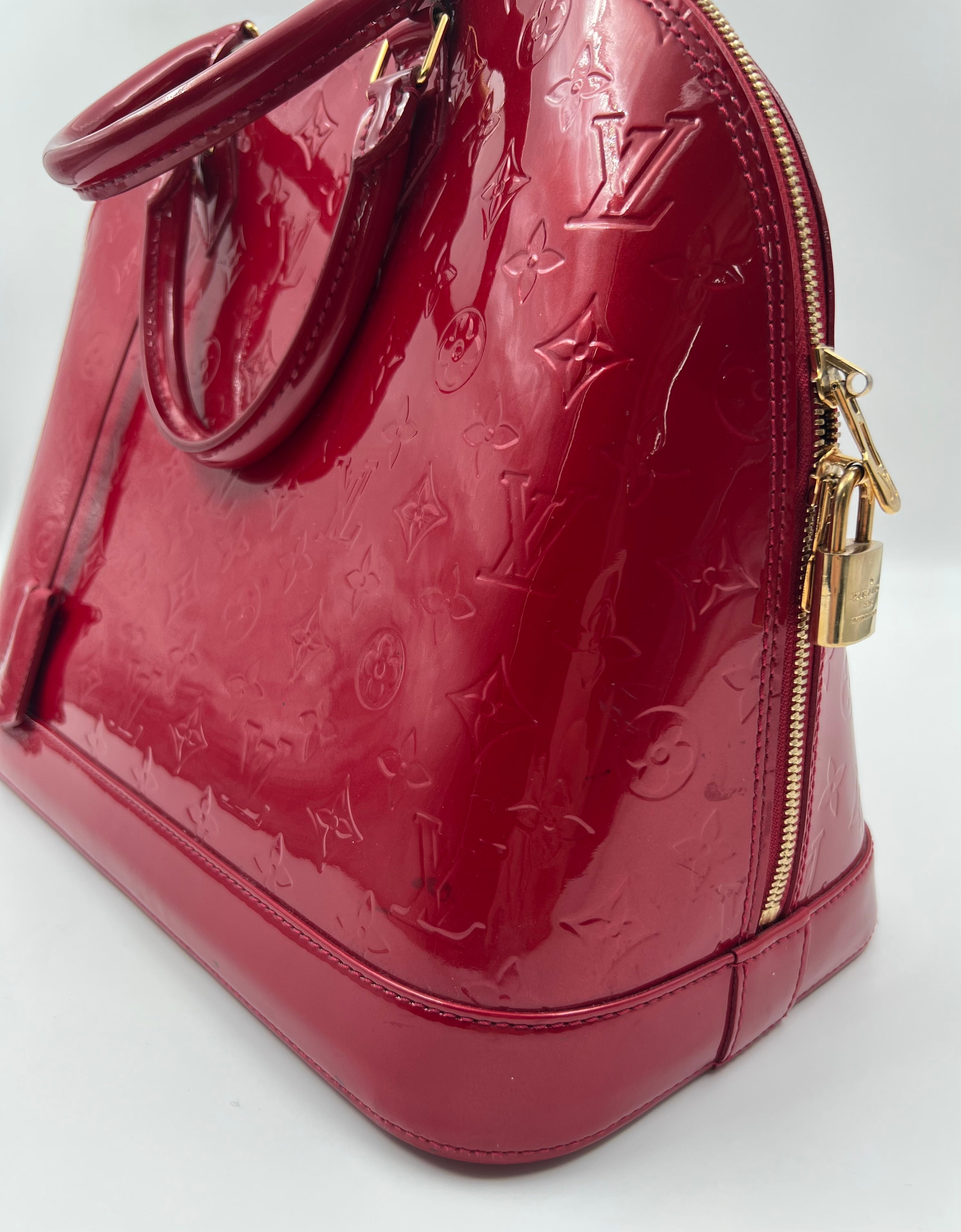 Louis Vuitton Monogram Vernis leather Alma MM handbag in red color
