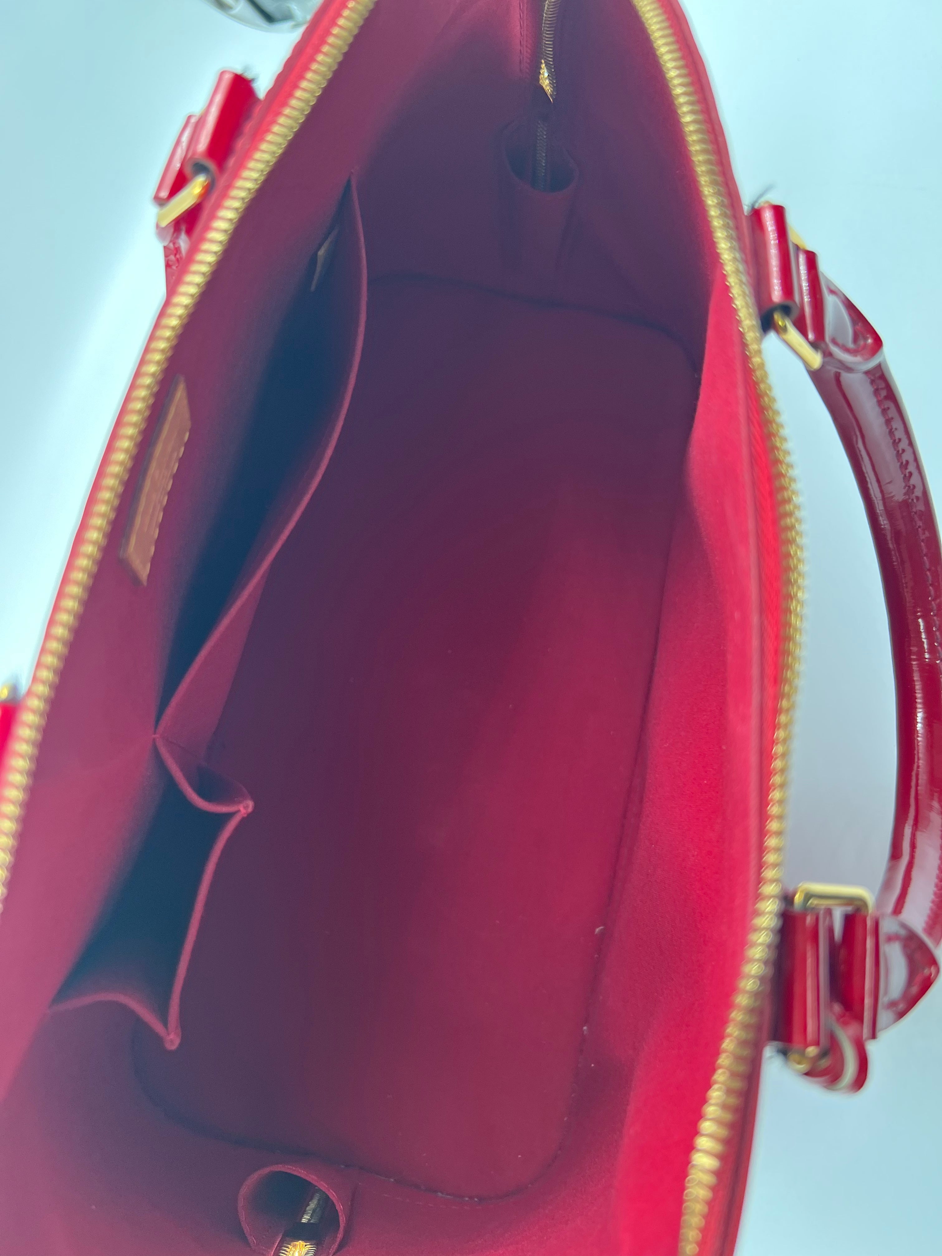 Louis Vuitton Monogram Vernis leather Alma MM handbag in red color