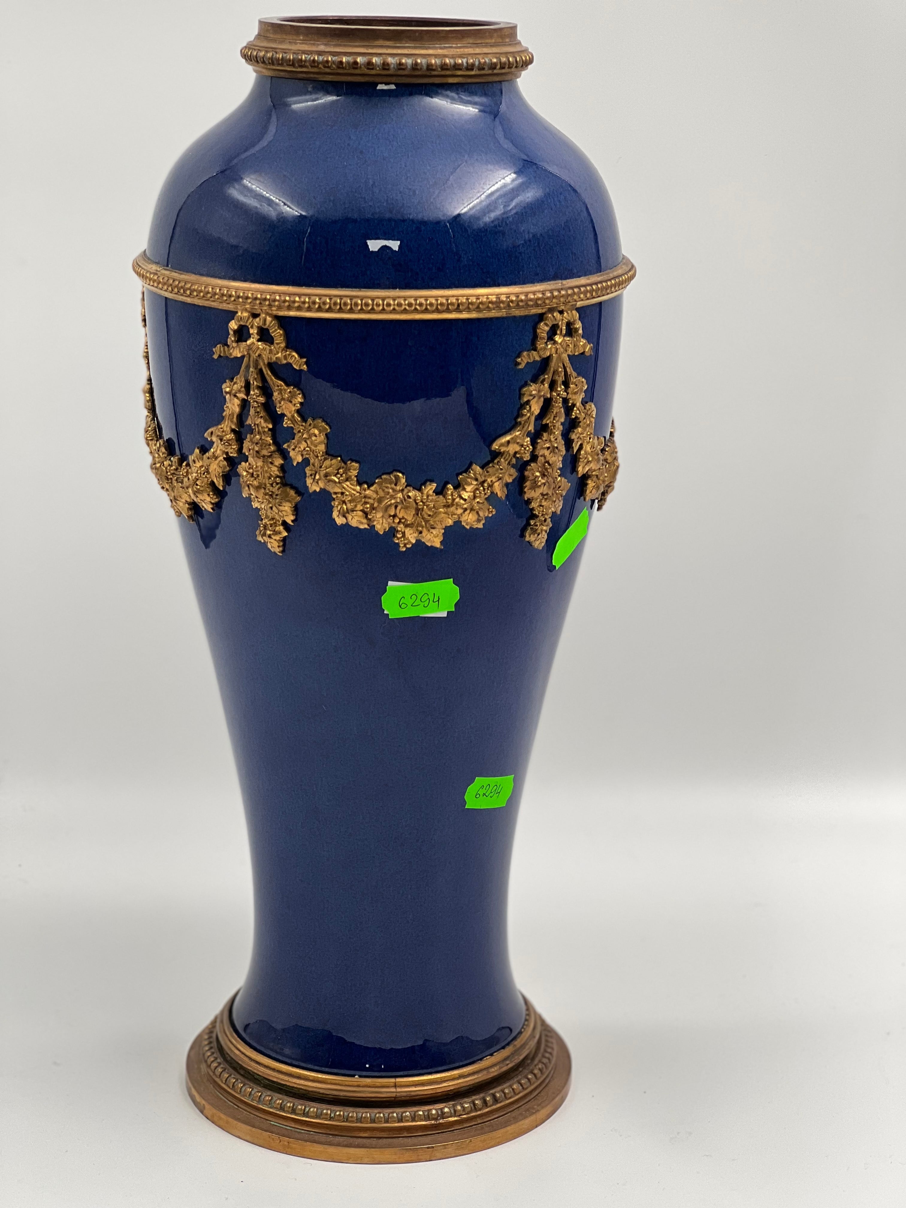 Antique French Sevres cobalt blue porcelain vase with the gilded bronze decor by Paul Milet