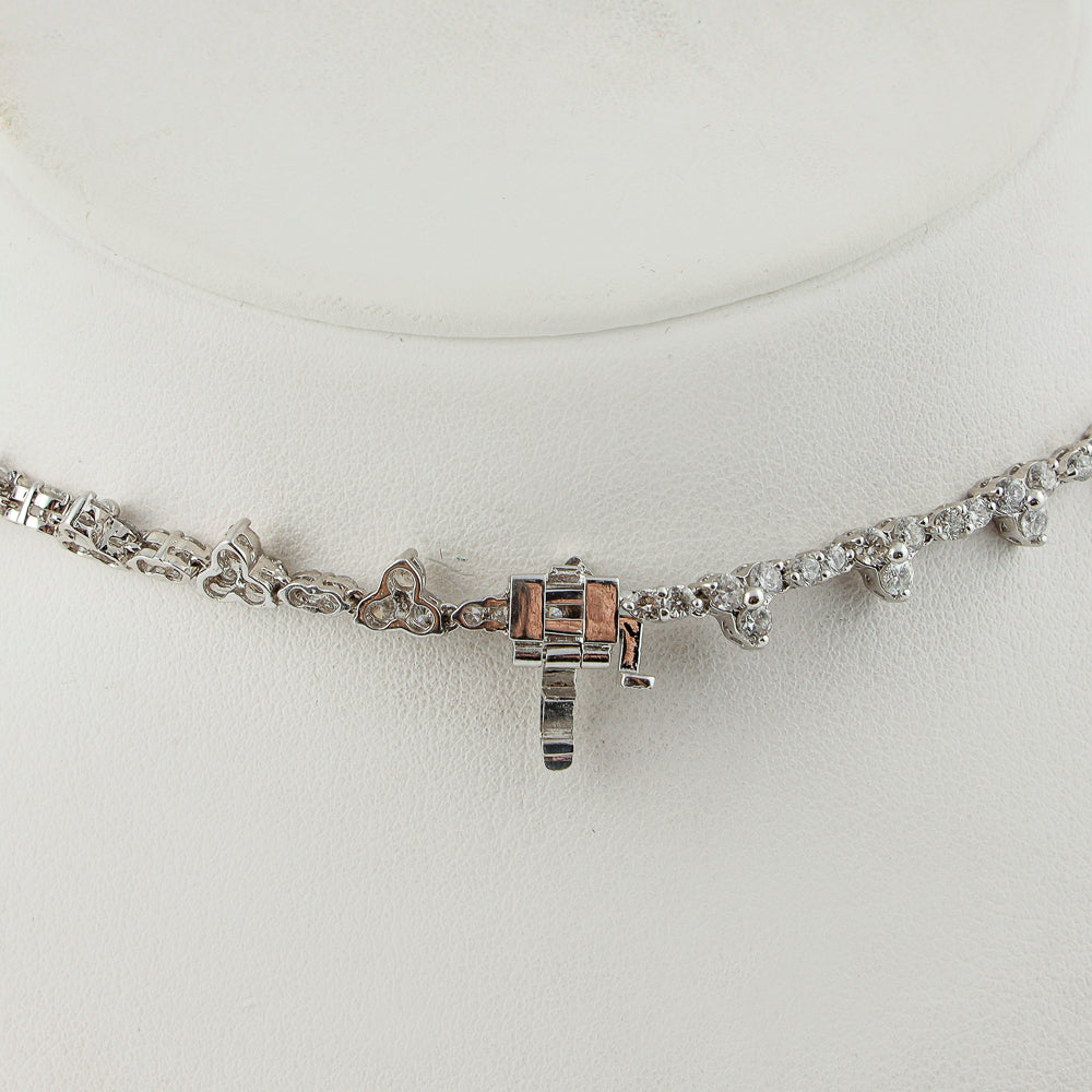 18k white gold drop necklace set with 24 ctw of natural diamonds & 37 ctw blue sapphires