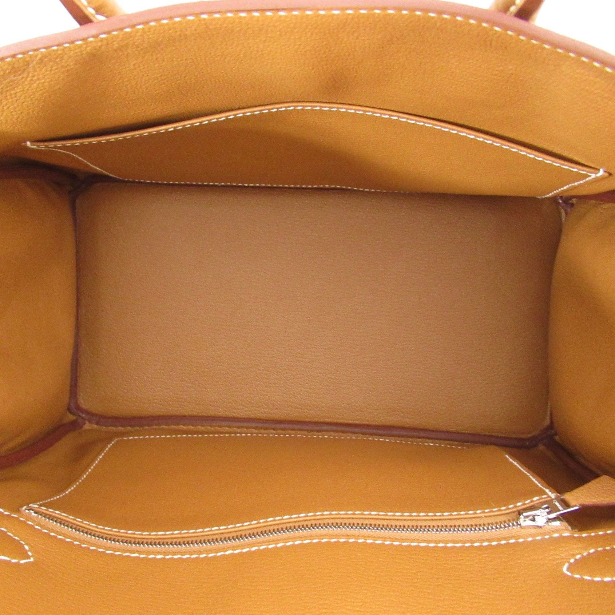 Pre-owned Hermes Birkin 30 handbag expertly crafted from Fauve Barenia Faubourg Togo leather and palladium hardware