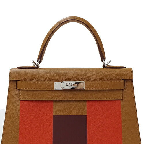 A LIMITED EDITION GOLD EPSOM, BORDEAUX SOMBRERO & CAPUCINE CHEVRE LEATHER LETTRE M KELLYGRAPHIE SELLIER KELLY 28
