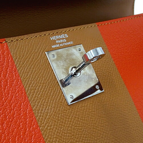 A LIMITED EDITION GOLD EPSOM, BORDEAUX SOMBRERO & CAPUCINE CHEVRE LEATHER LETTRE M KELLYGRAPHIE SELLIER KELLY 28