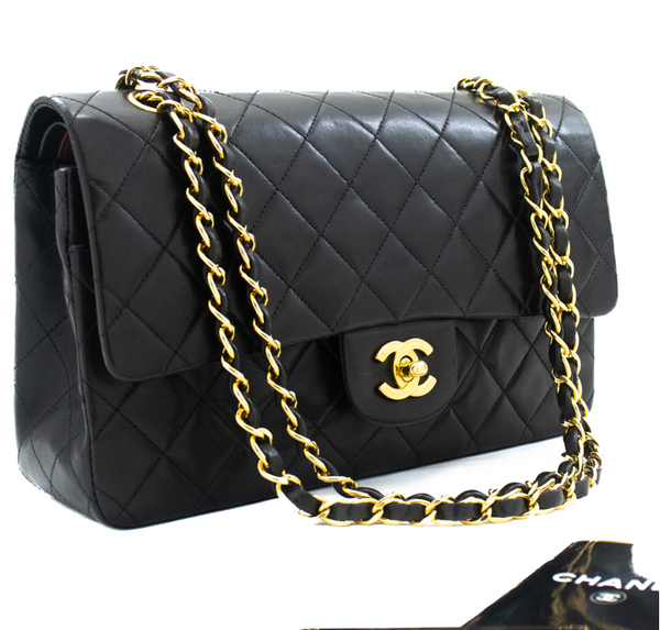 Classic Chanel handbag crafted from luxurious lambskin leather in a black hue