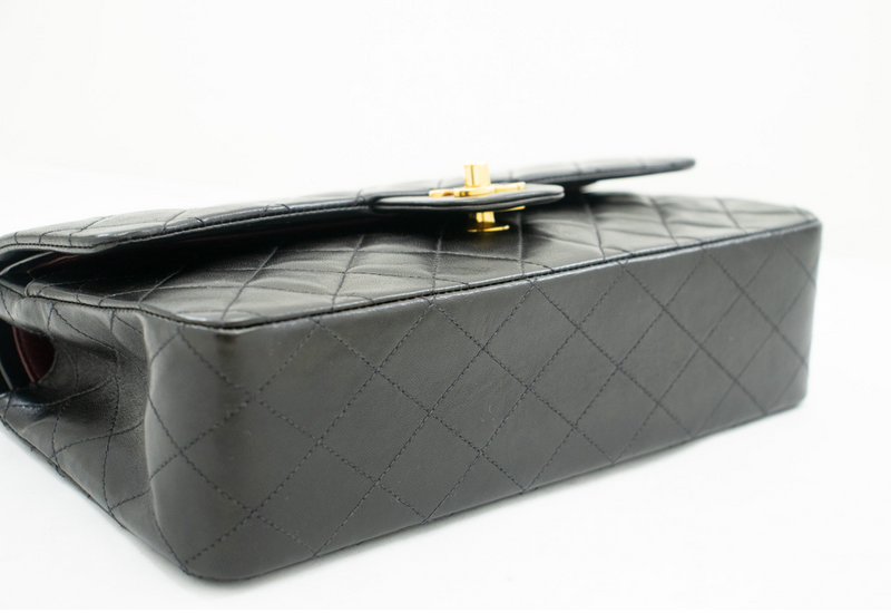 Classic Chanel handbag crafted from luxurious lambskin leather in a black hue
