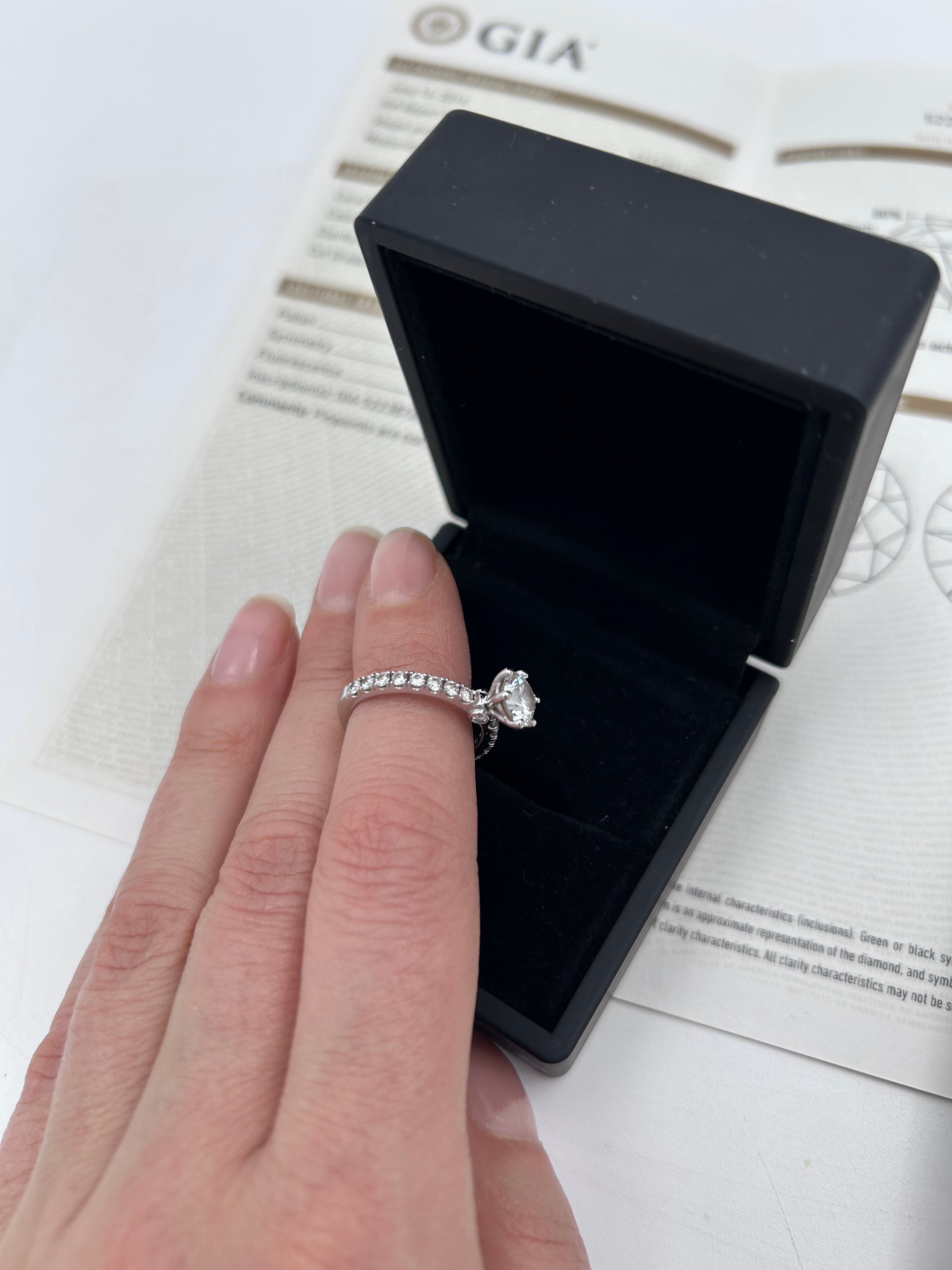 Pre-owned solitaire ring featuring a natural 1.20ct round brilliant diamond (VS2, H color)