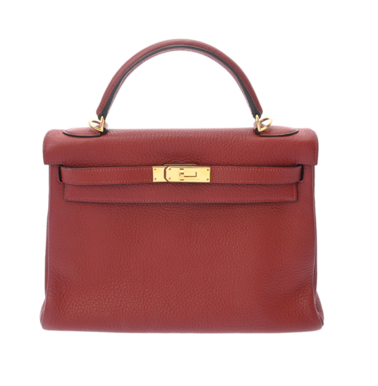 Hermes Kelly 32 in a red leather with a strap and accessories