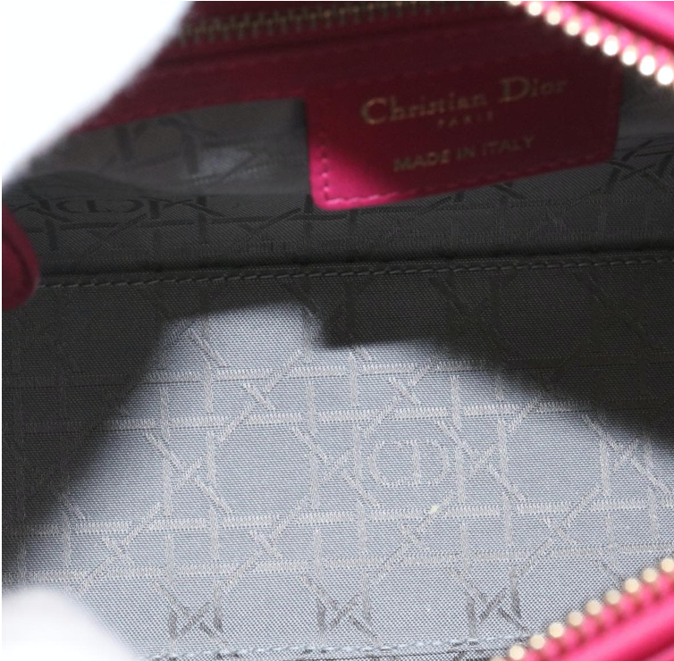 Lady Dior mini handbag in fuchsia lambskin leather with a long strap