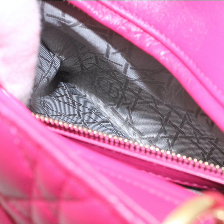Lady Dior mini handbag in fuchsia lambskin leather with a long strap