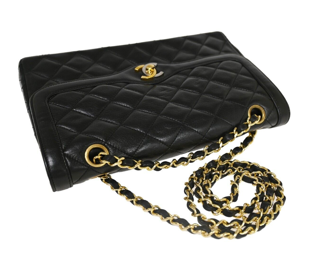 Bolso vintage CHANEL de doble solapa con cierre bicolor en juego completo