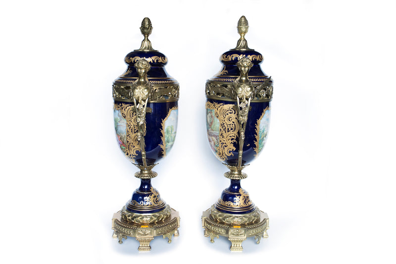 Set of two Sevres hand-painted soft-porcelain decorative vases