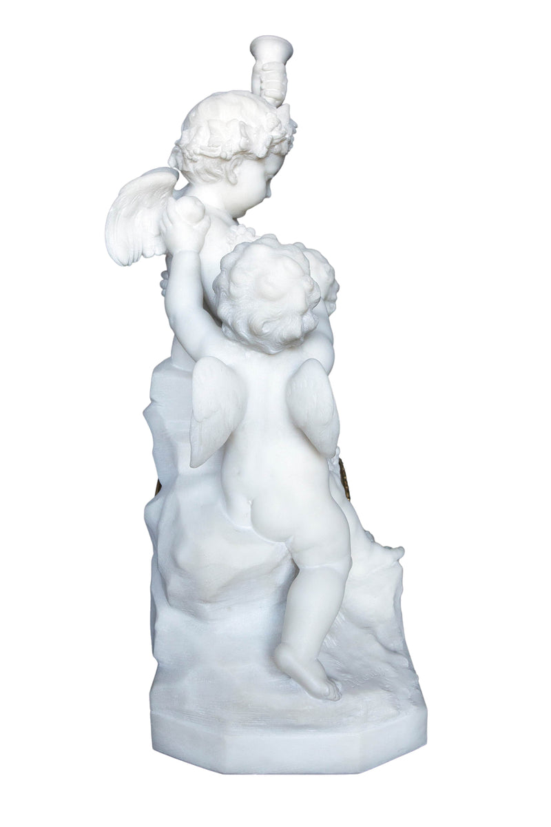 Carrara marble clock made in a shape of a sculpture depicting angels