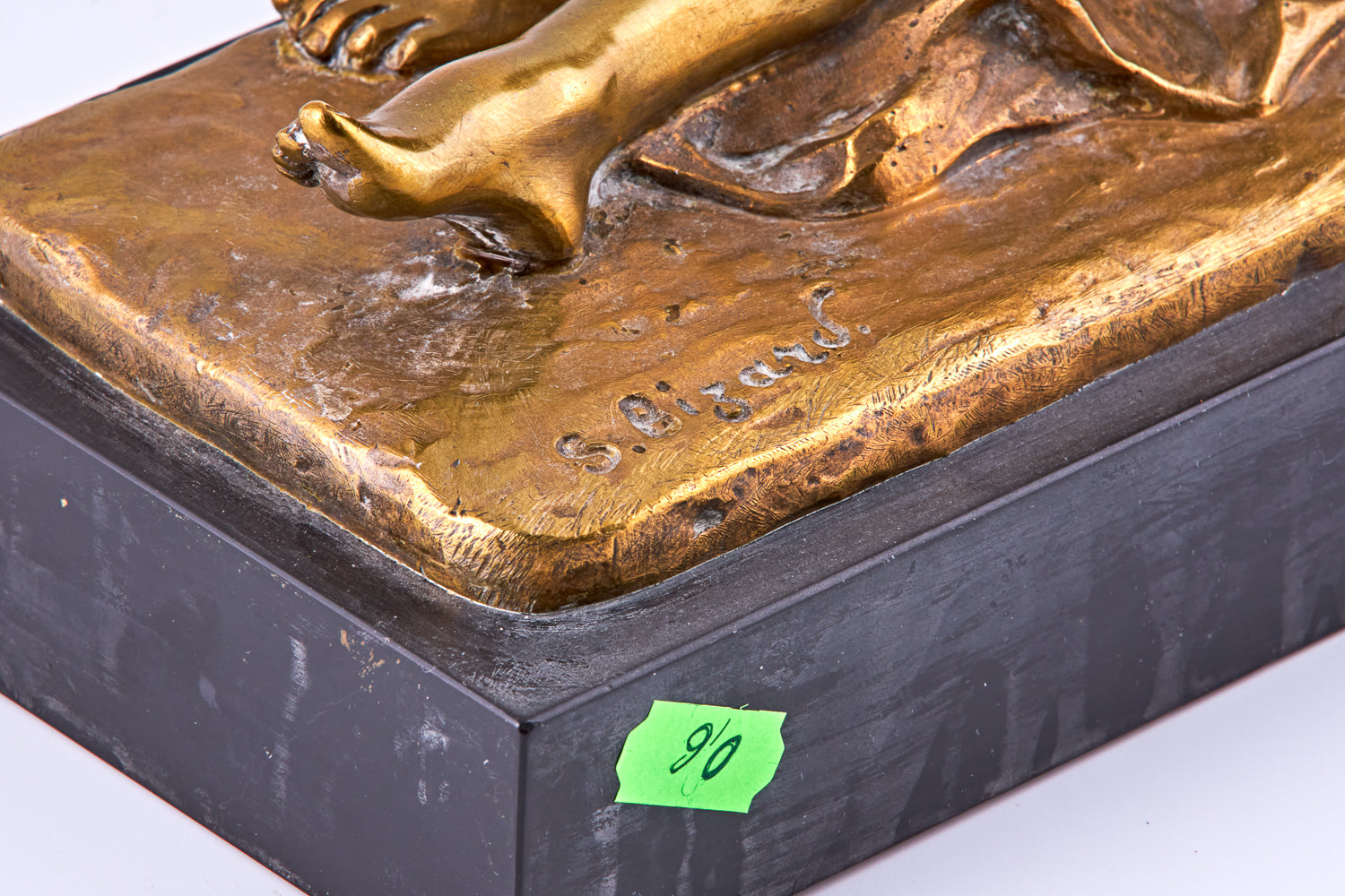 An early 20th century gold plated bronze sculpture of nude lady and a bird