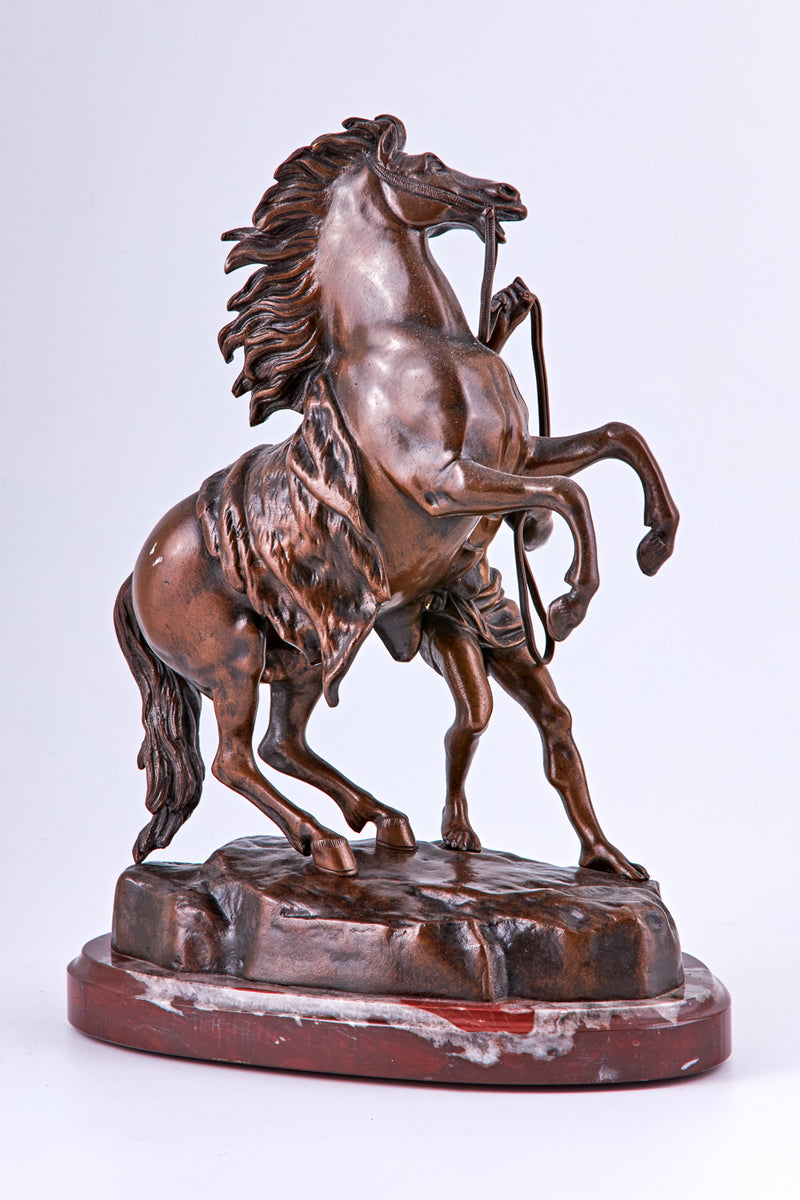 Pair of 19th Century “Cheval de Marly horse and Temper” bronze sculptures on marble plinth
