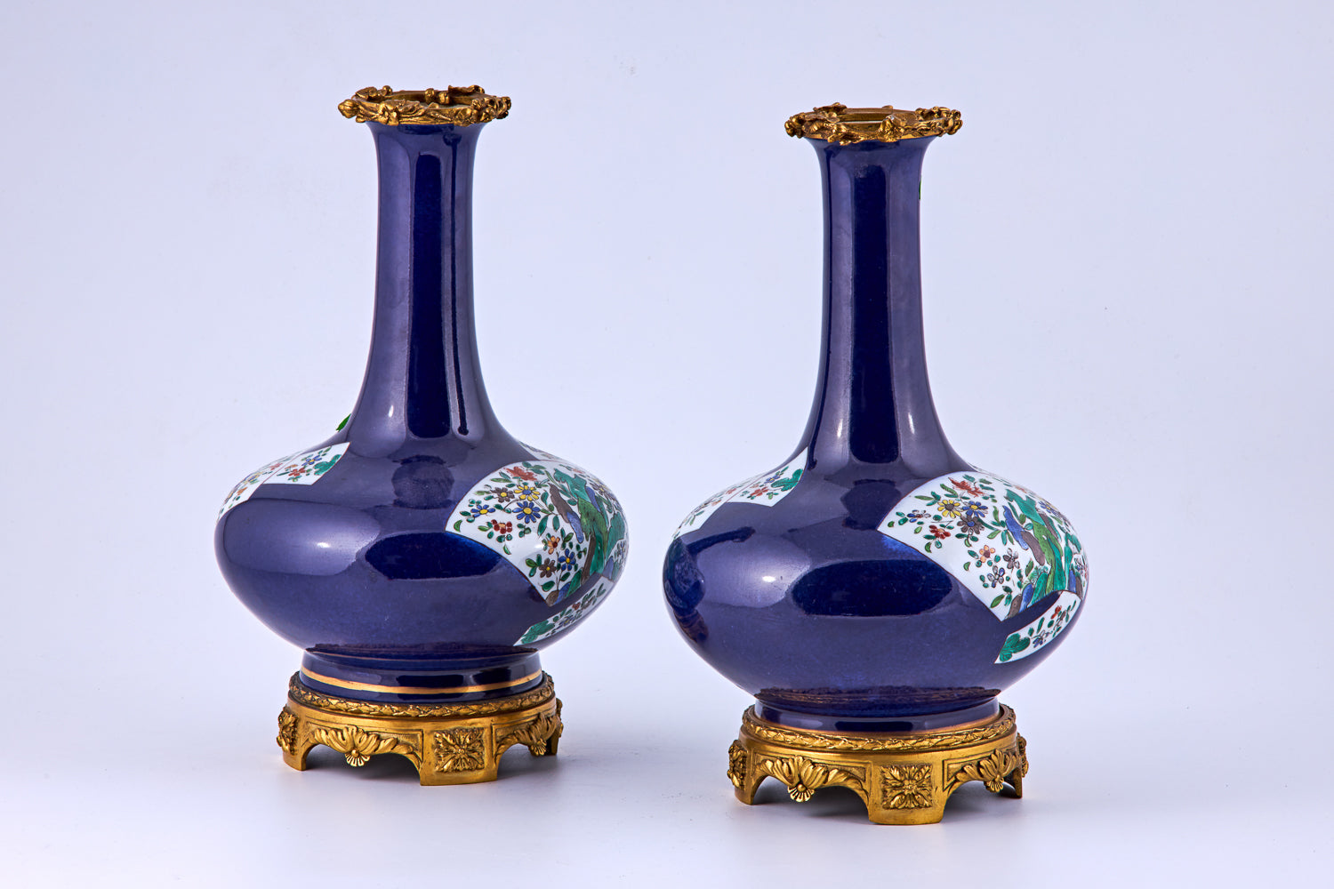 Pair of porcelain vases with bronze decorative elements