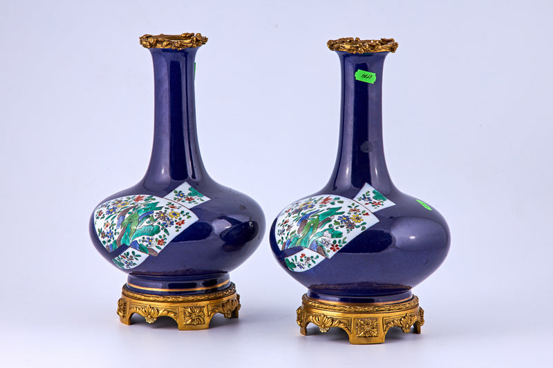 Pair of porcelain vases with bronze decorative elements