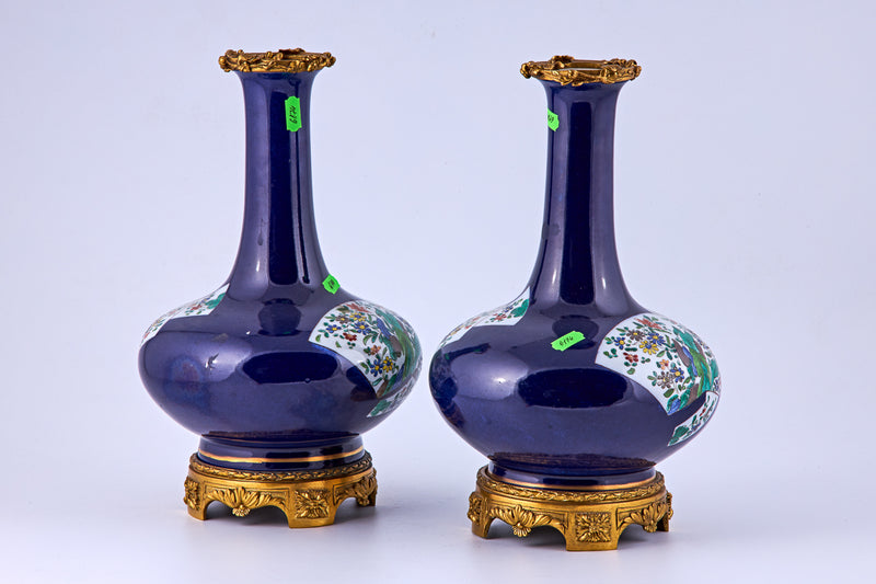 Pair of porcelain vases with bronze decorative elements