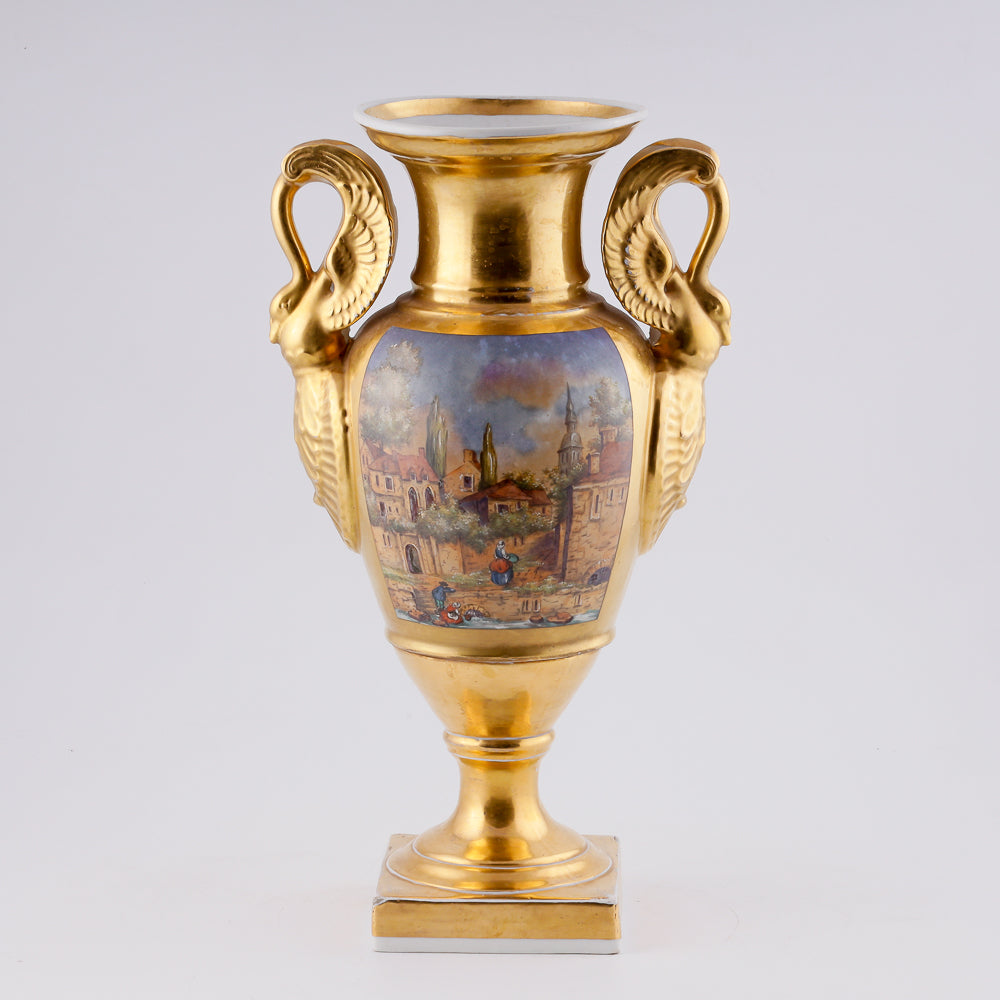 Antique porcelain vase in classical form with gold plated handles in the form of swans