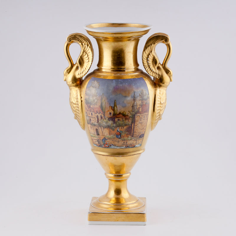Antique porcelain vase in classical form with gold plated handles in the form of swans
