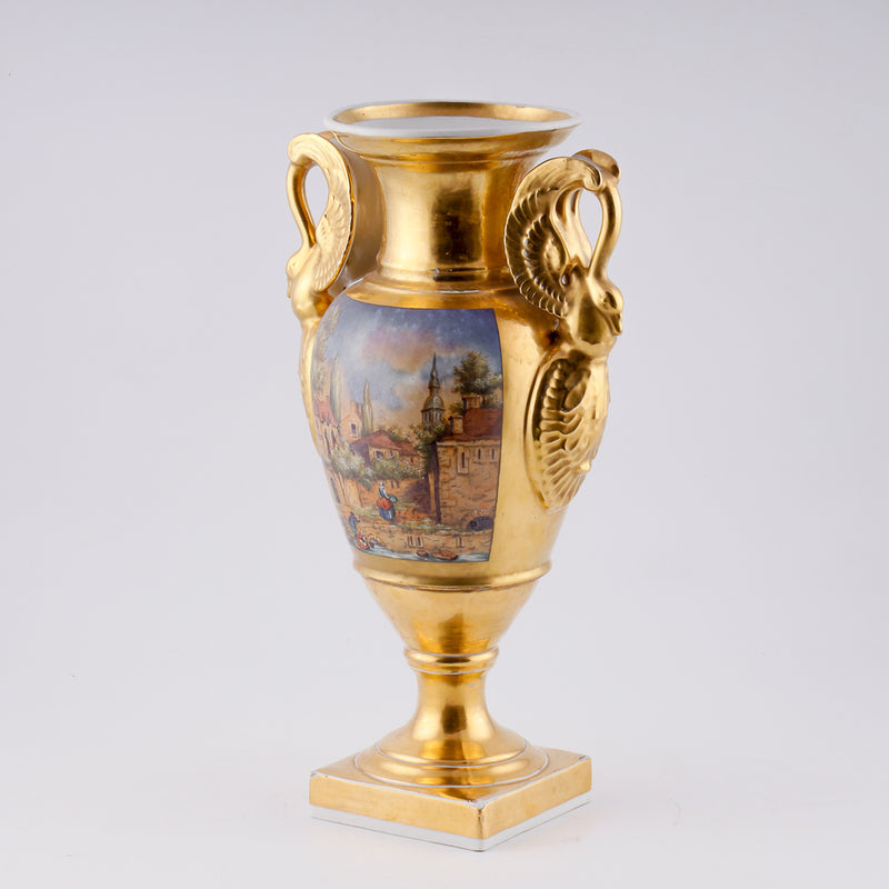 Antique porcelain vase in classical form with gold plated handles in the form of swans