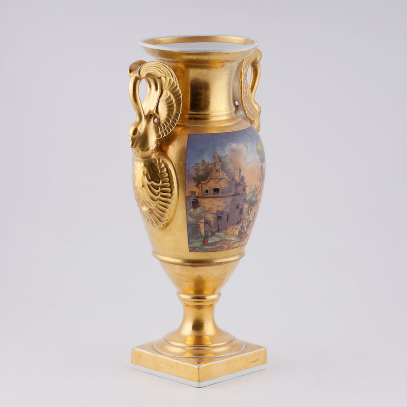 Antique porcelain vase in classical form with gold plated handles in the form of swans