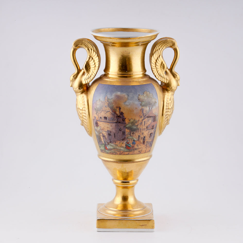 Antique porcelain vase in classical form with gold plated handles in the form of swans