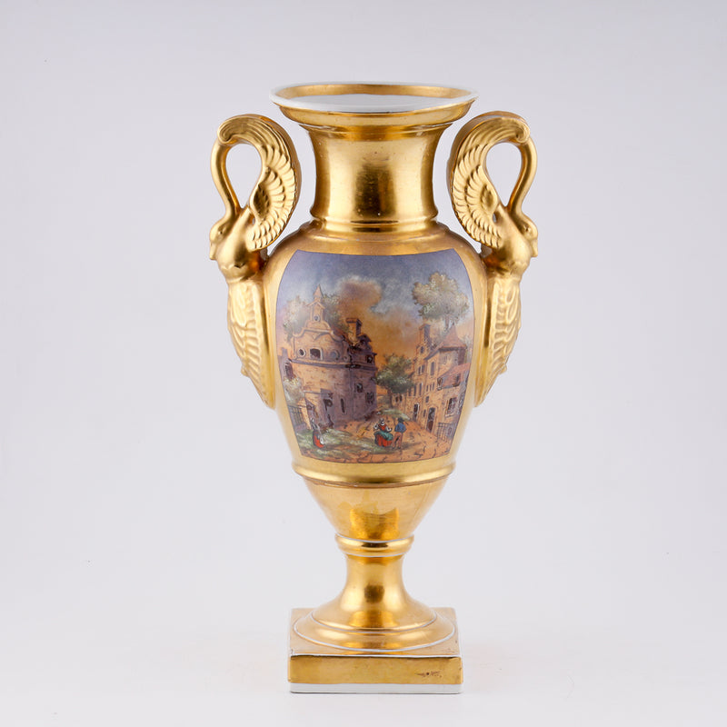 Antique porcelain vase in classical form with gold plated handles in the form of swans