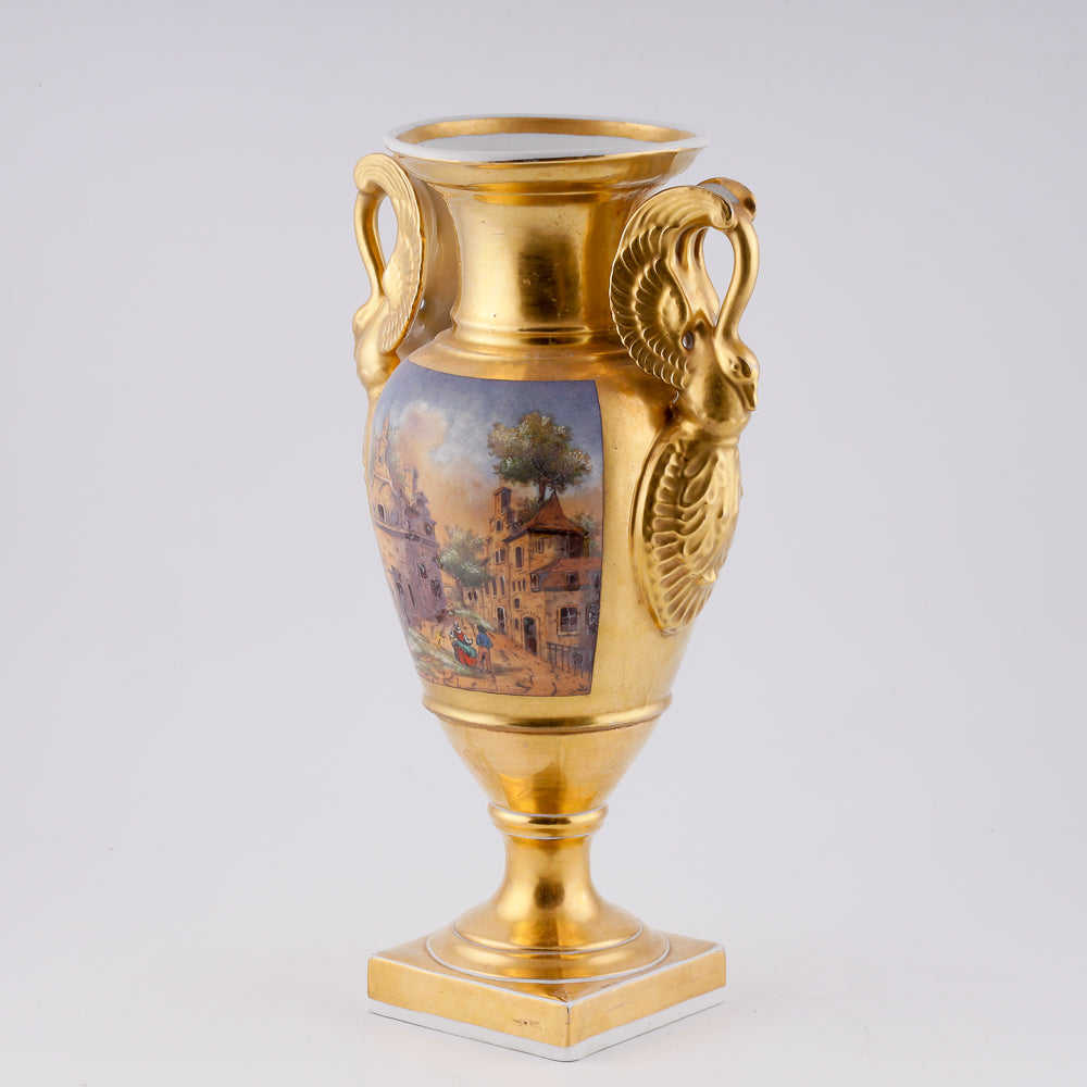 Antique porcelain vase in classical form with gold plated handles in the form of swans