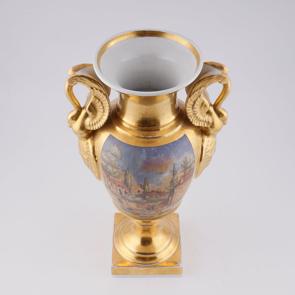 Antique porcelain vase in classical form with gold plated handles in the form of swans