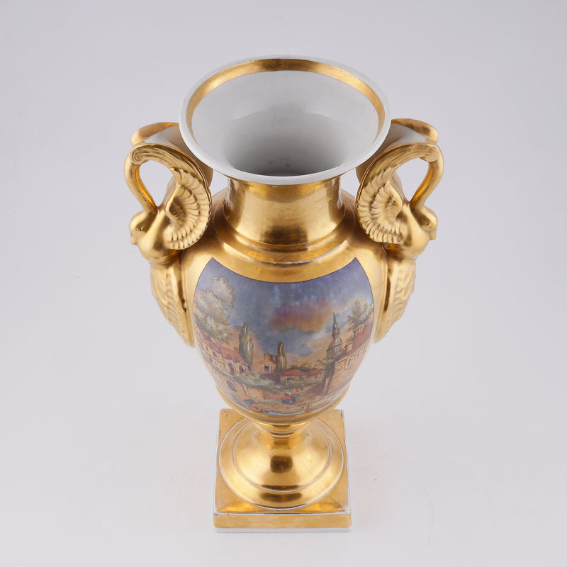 Antique porcelain vase in classical form with gold plated handles in the form of swans