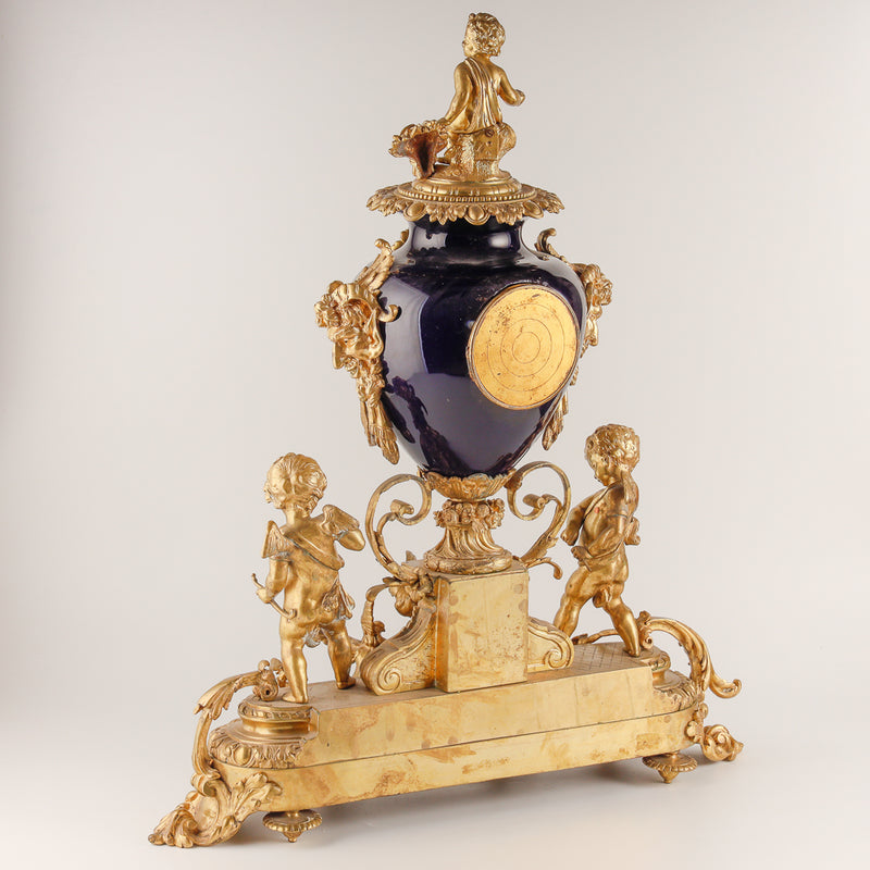 Large cobalt blue salon clock set with two vases