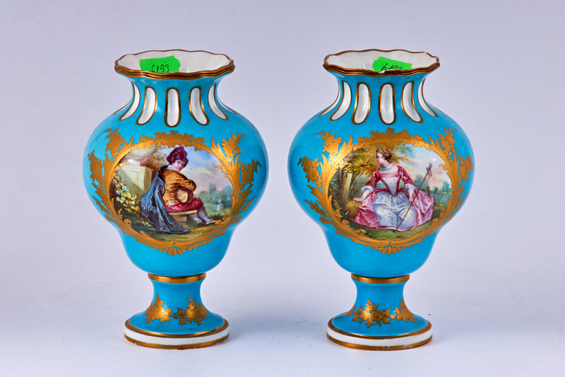 Pair of Sevres blue hand painted porcelain vases with polychromatic decoration