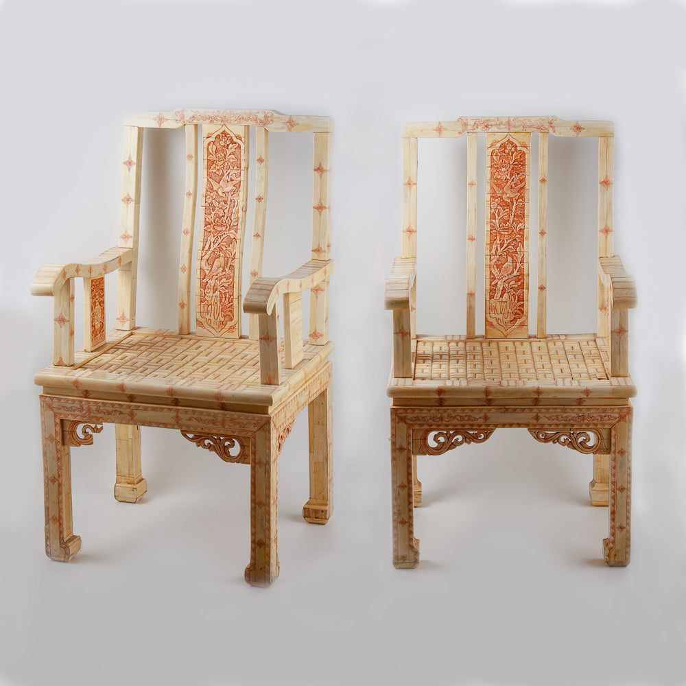 Pair of ivory armchairs with inlayed Asian motifs