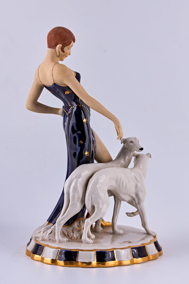 Porcelain Figurine of a “Flapper with two Borzoi dogs”