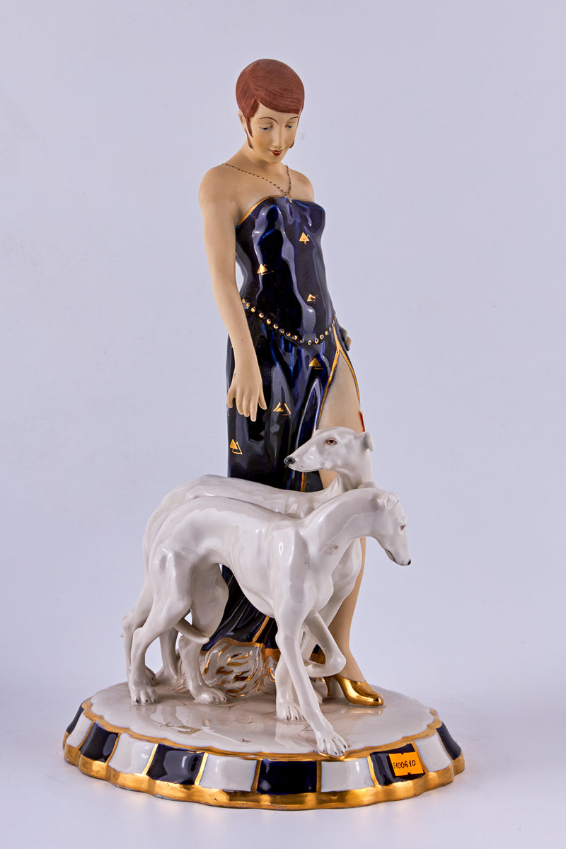 Porcelain Figurine of a “Flapper with two Borzoi dogs”