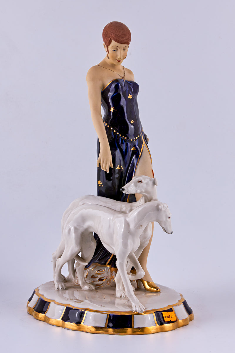 Porcelain Figurine of a “Flapper with two Borzoi dogs”