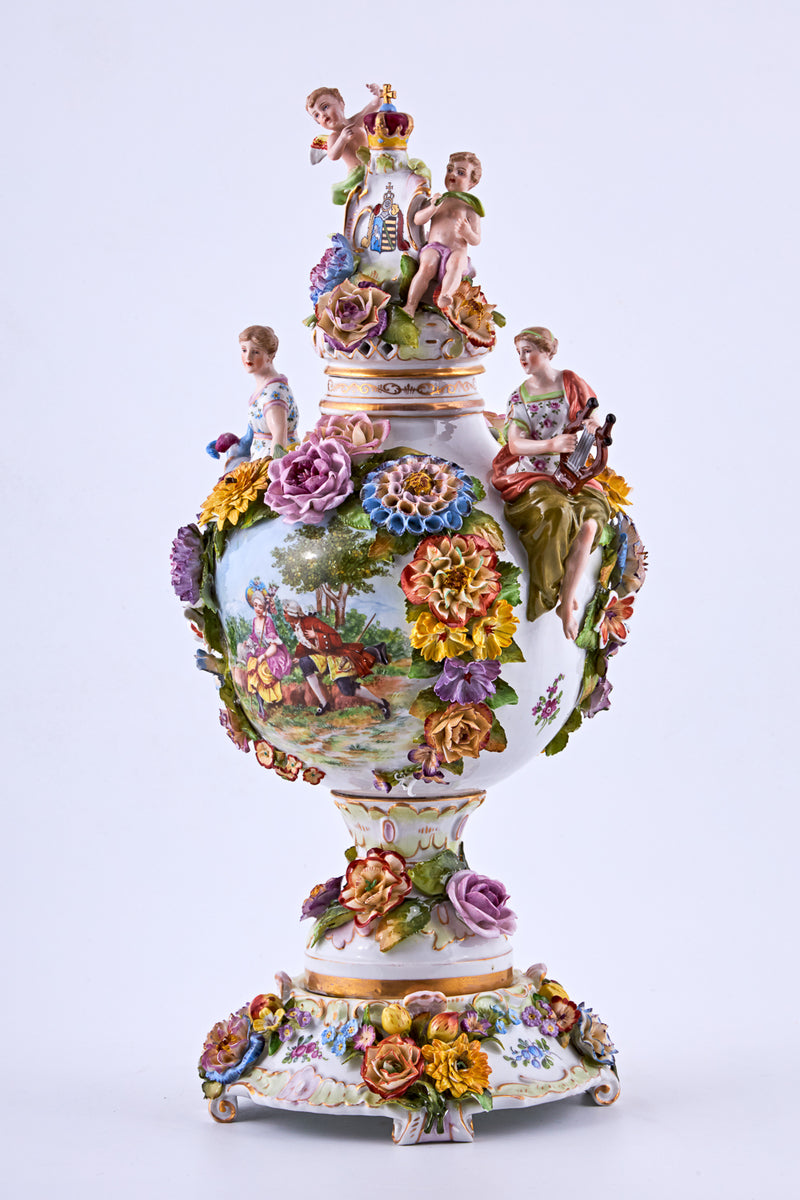 Porcelain vase with stucco flowers and rococo motifs