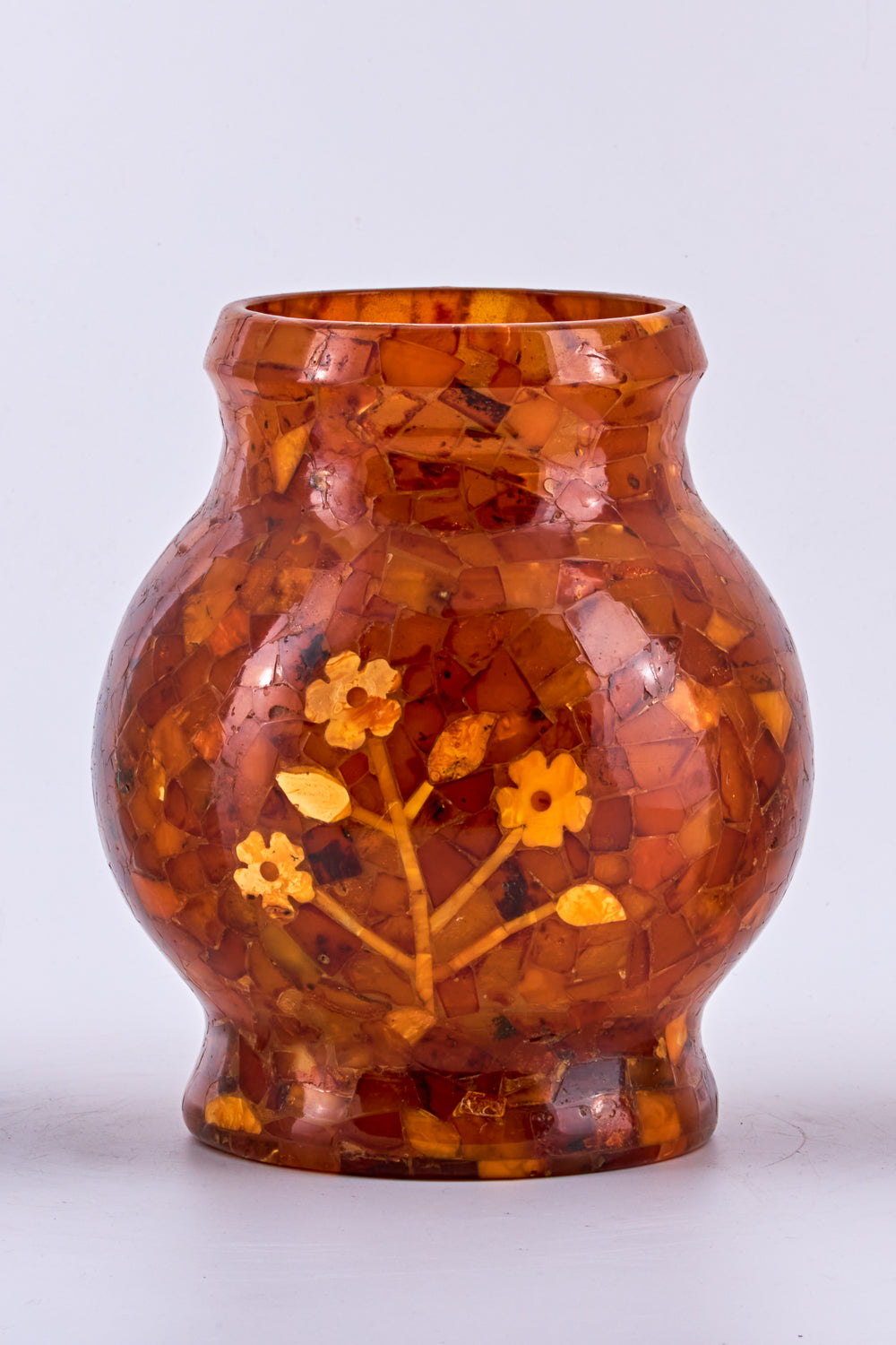 Baltic Amber vase with inlaid flower design