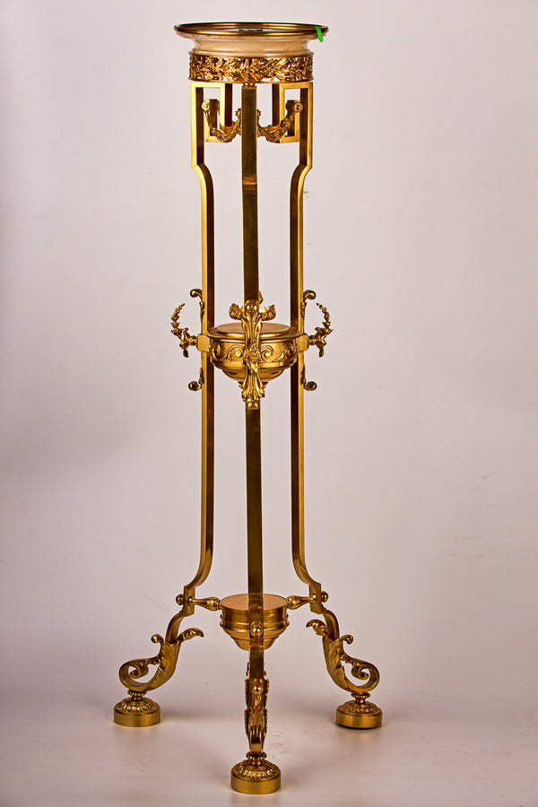 Consola de bronce bañada en oro con tablero de mármol.