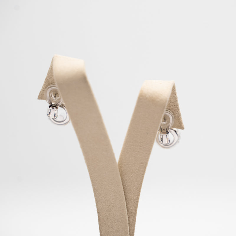 Chopard diamond drop earrings from "Happy Diamonds collection"