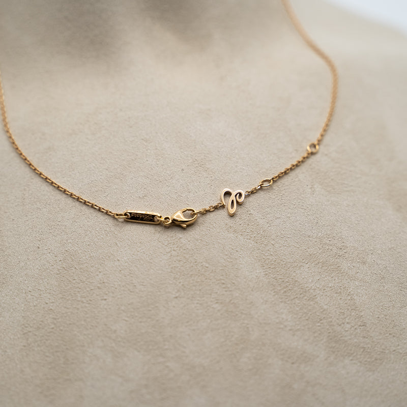 Chopard 18k rose gold necklace from "Happy Diamonds" collection