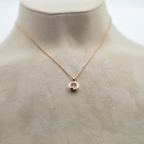 Chopard 18k rose gold Happy Diamonds round pendant from "Icons" collection
