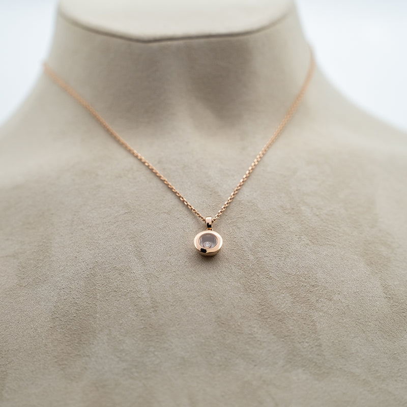 Chopard 18k rose gold Happy Diamonds round pendant from "Icons" collection