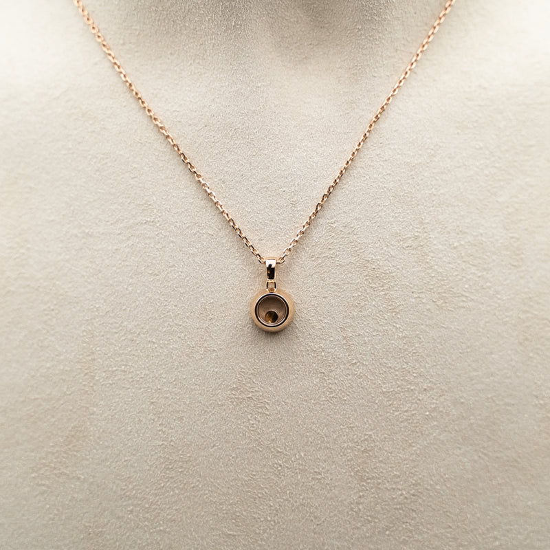 Chopard 18k rose gold Happy Diamonds round pendant from "Icons" collection