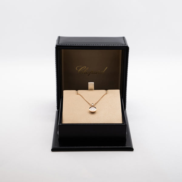 Colgante redondo Happy Diamonds de Chopard en oro rosa de 18 quilates de la colección "Icons"
