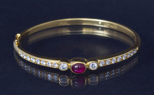 Vintage 18k Yellow gold bracelet set with natural diamonds and one natural ruby