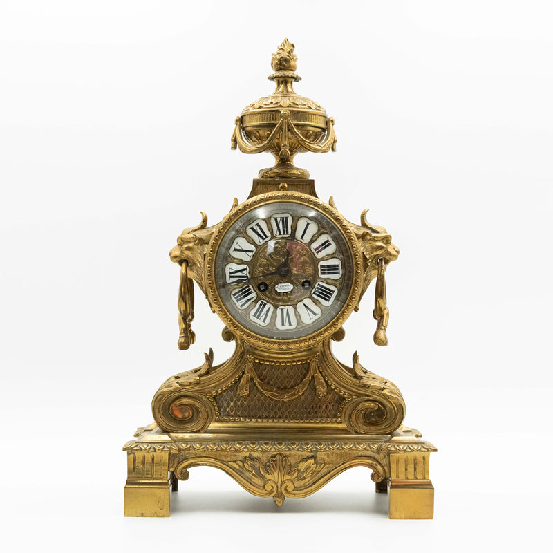 Antique Eclectic style bronze mantel clock with two candelabras in the style of Napoleon 3rd. decor